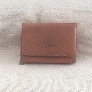 Light pink Roots leather wallet.